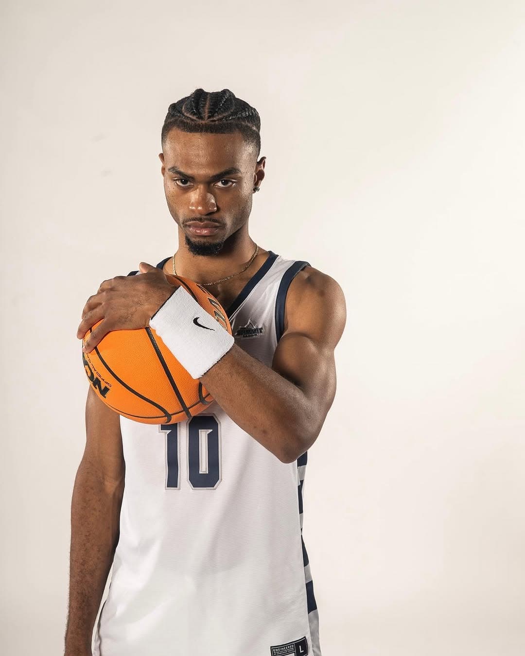 Issac McBride - #10 jersey portrait with basketball